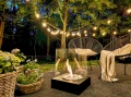 Biokominek-wolnostojacy-Sunset-Garden-czarny-aranzacja-010.webp